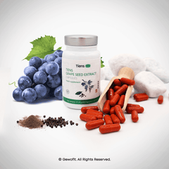a bottle of grape seed extract next to a pile of grapes